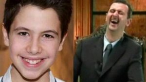 بشار ونجله حافظ في لقطة ضاحكة ( الارشيف)